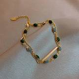 Pulsera doble con charms