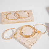 Conjunto de pulseras Knotted Elegante