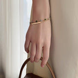 Pulsera doble con charms