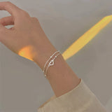 Pulsera ajustable con corazón en plata
