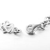Pulsera con Colgantes de Pata de Perro y Hueso en Plata Pura
