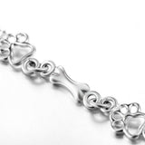 Pulsera con Colgantes de Pata de Perro y Hueso en Plata Pura