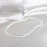 Pulsera de plata con circonita