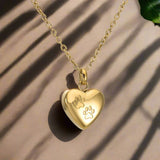 Collar con urna conmemorativa para mascotas – Colgante en forma de corazón con grabado de una pata