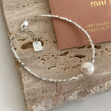 Pulsera cuadrada Amor Plateada