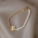 Pulsera floral vintage con perlas y oro