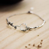 Pulsera vintage de plata con ramo de flores